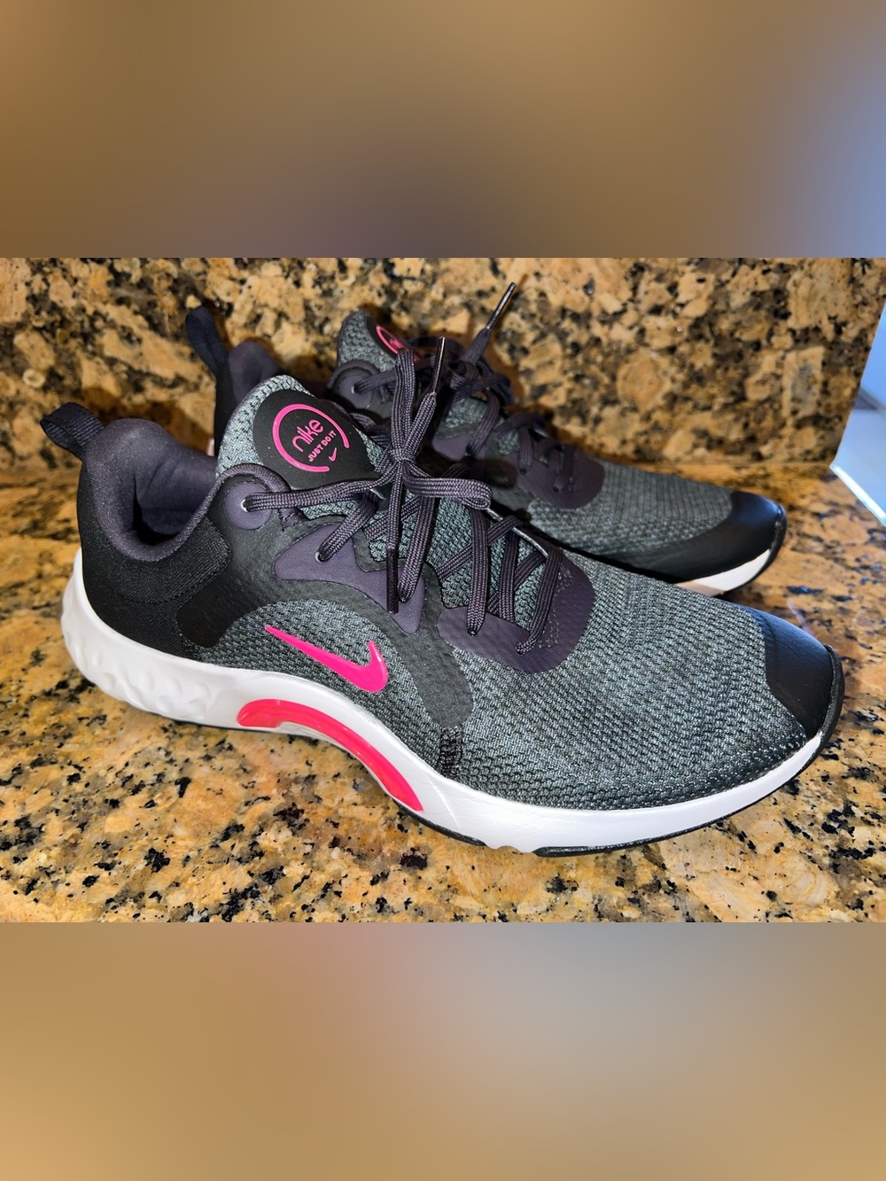 Nike Women’s Grey Knit Athletic Sneakers with Pink Accents